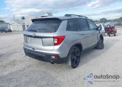 2019 Honda Passport Elite z USA, uszkodzony, nr VIN 5FNYF8H05KB010810
